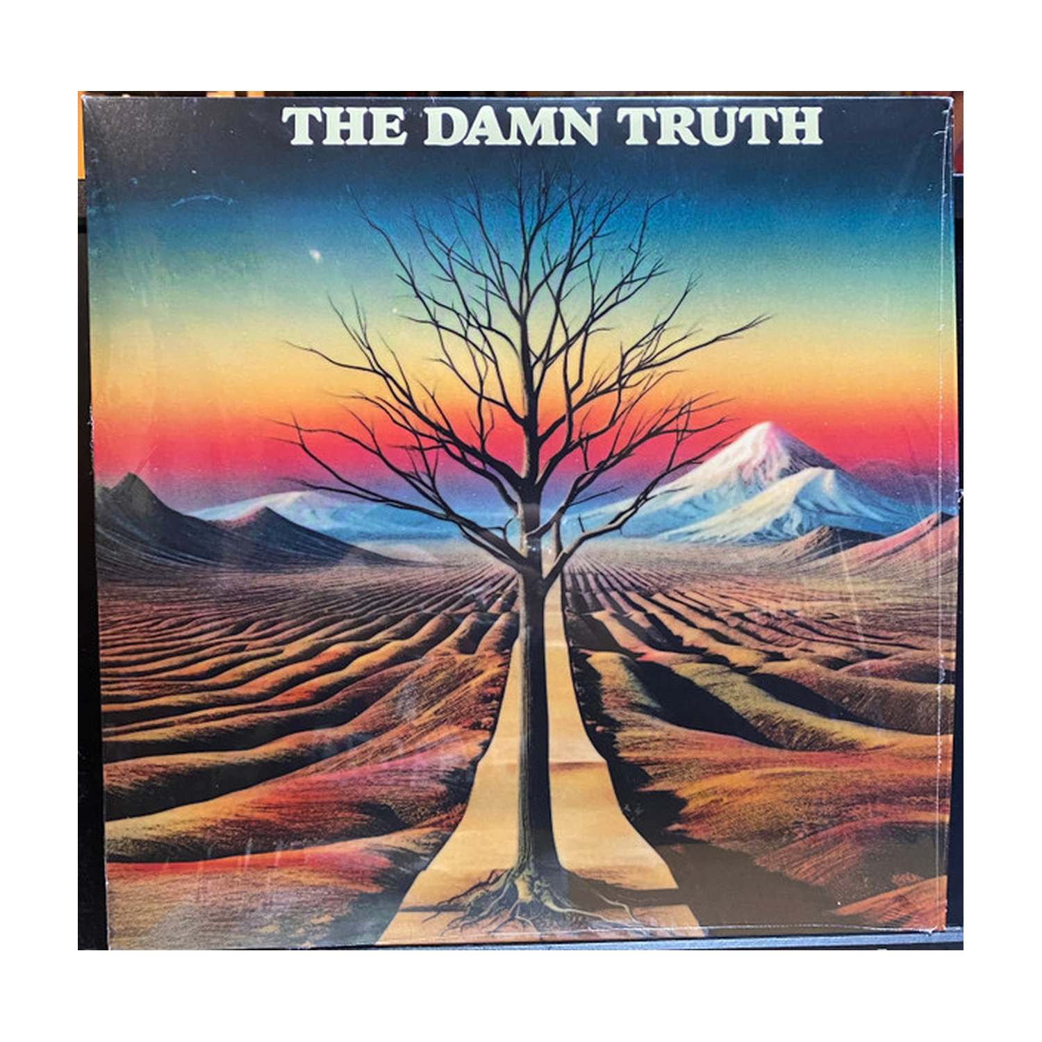 Damn Truth - Translucent Blue with Splatter Colored Vinyl (Blue Vinyl)