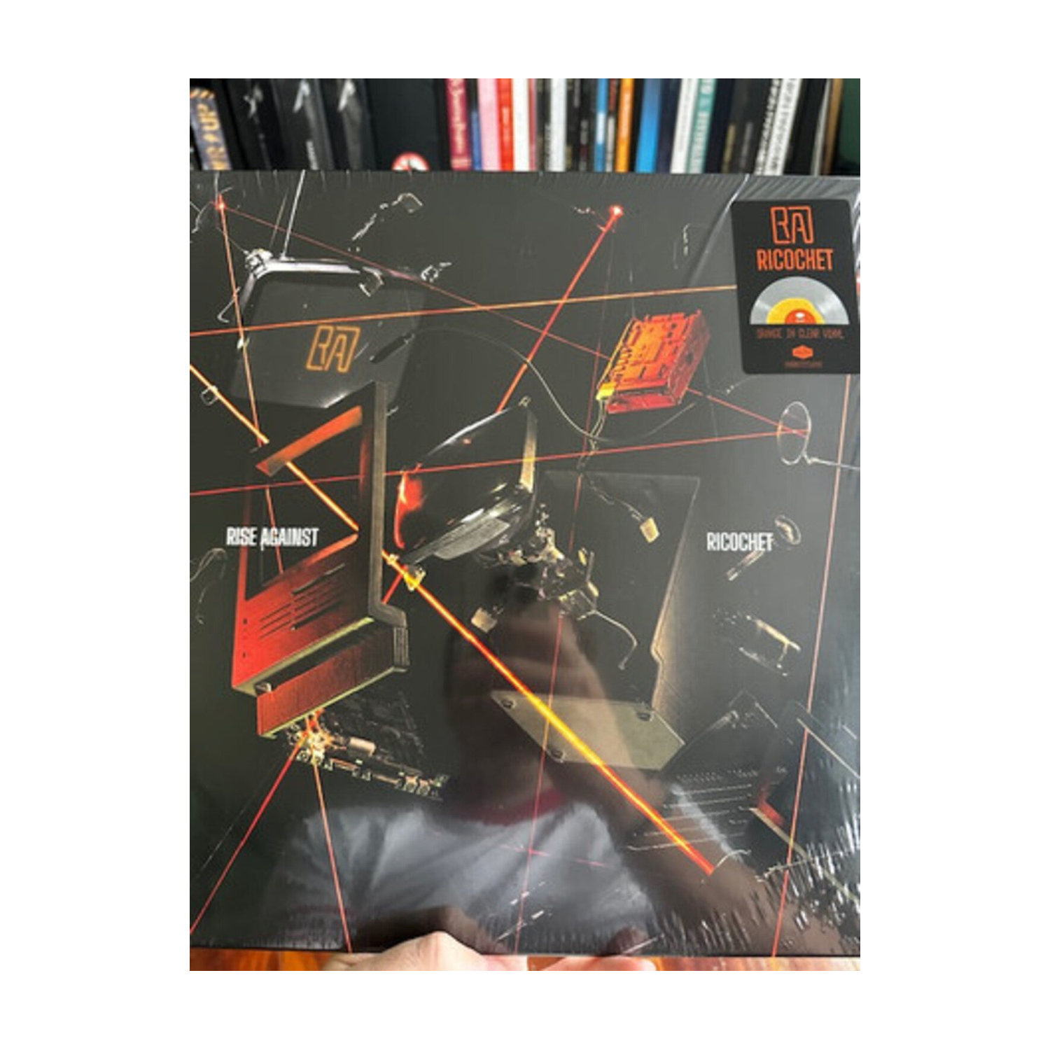 Rise Against - Ricochet - Limited Colored Vinyl with Opaque Orange Center & Clear Outside (Orange Vinyl)