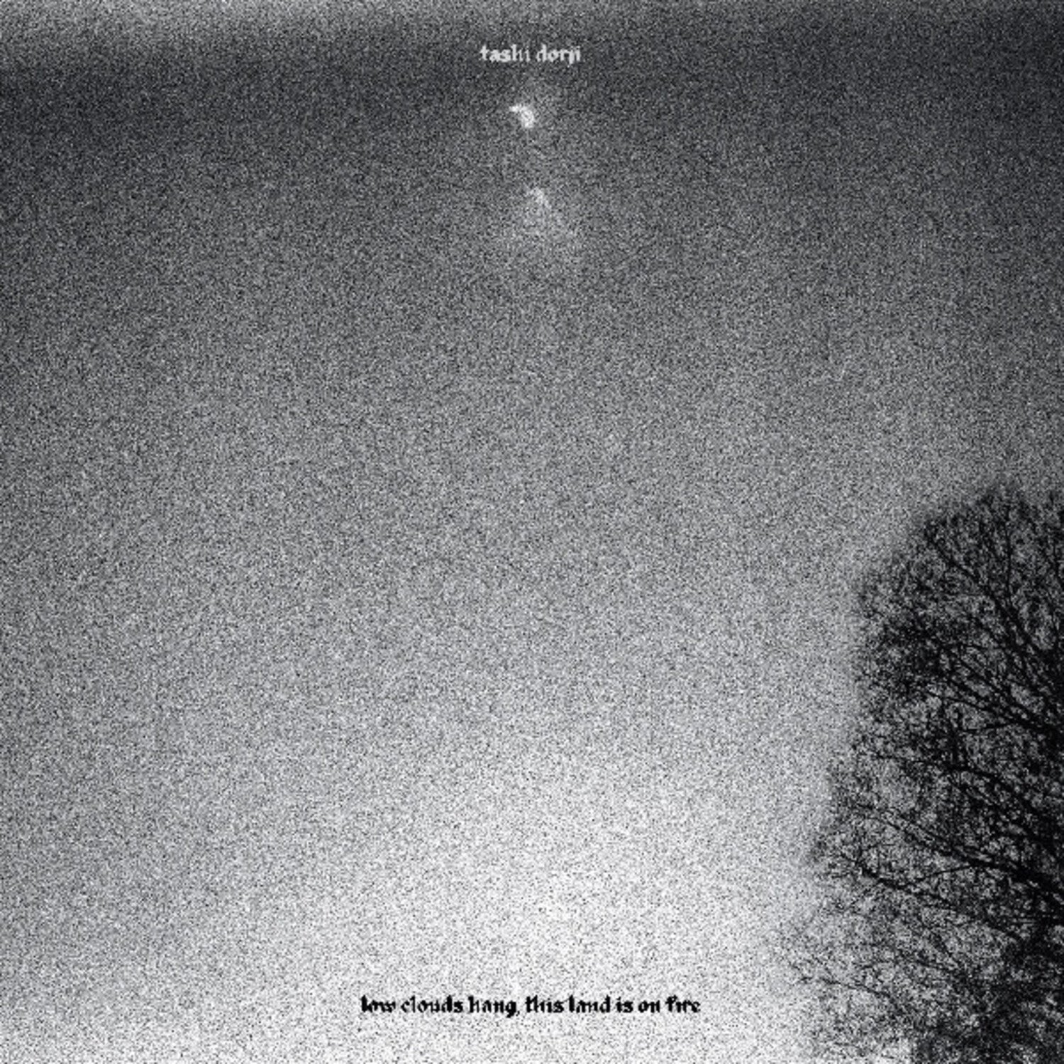 Tashi Dorji - low clouds hang, this land is on fire