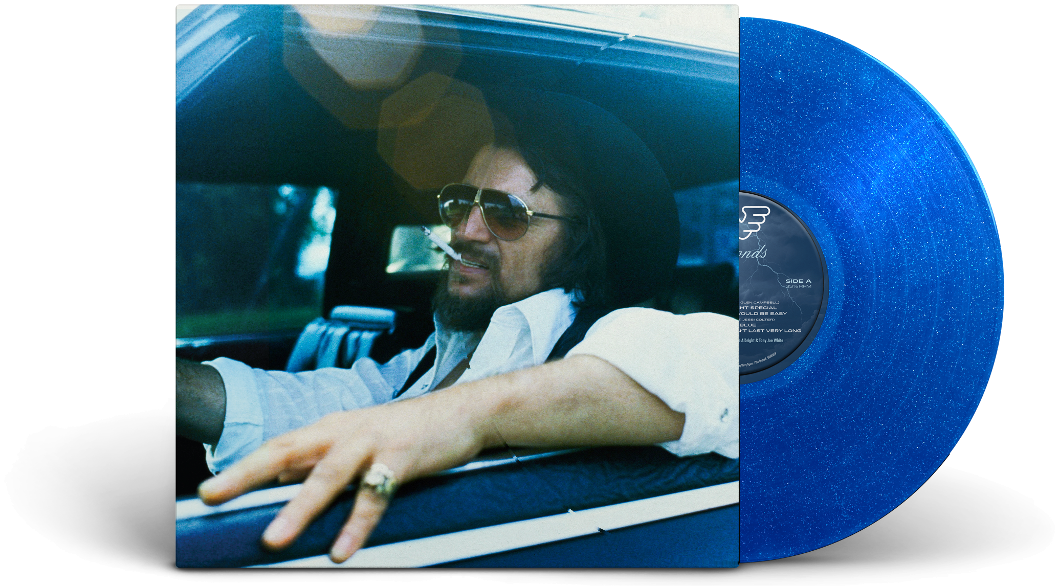 Waylon Jennings Diamonds jacket beside the Diamond Burst vinyl record