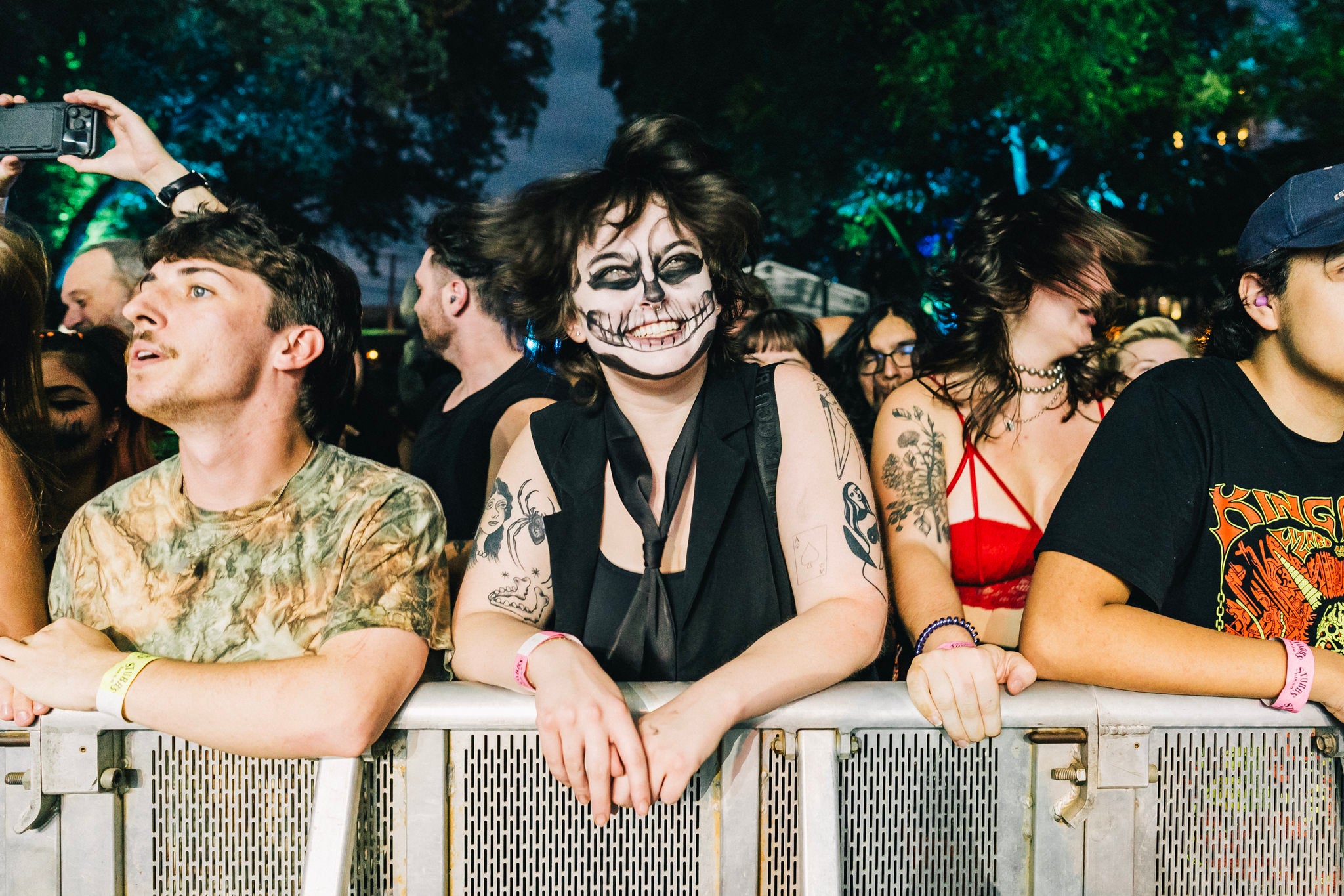 Front-row fans at the Levitation festival barricade
