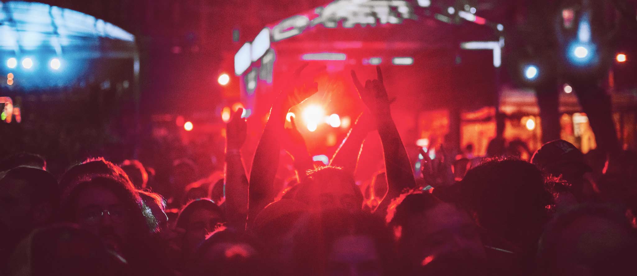 Levitation festival crowd, red stage lights