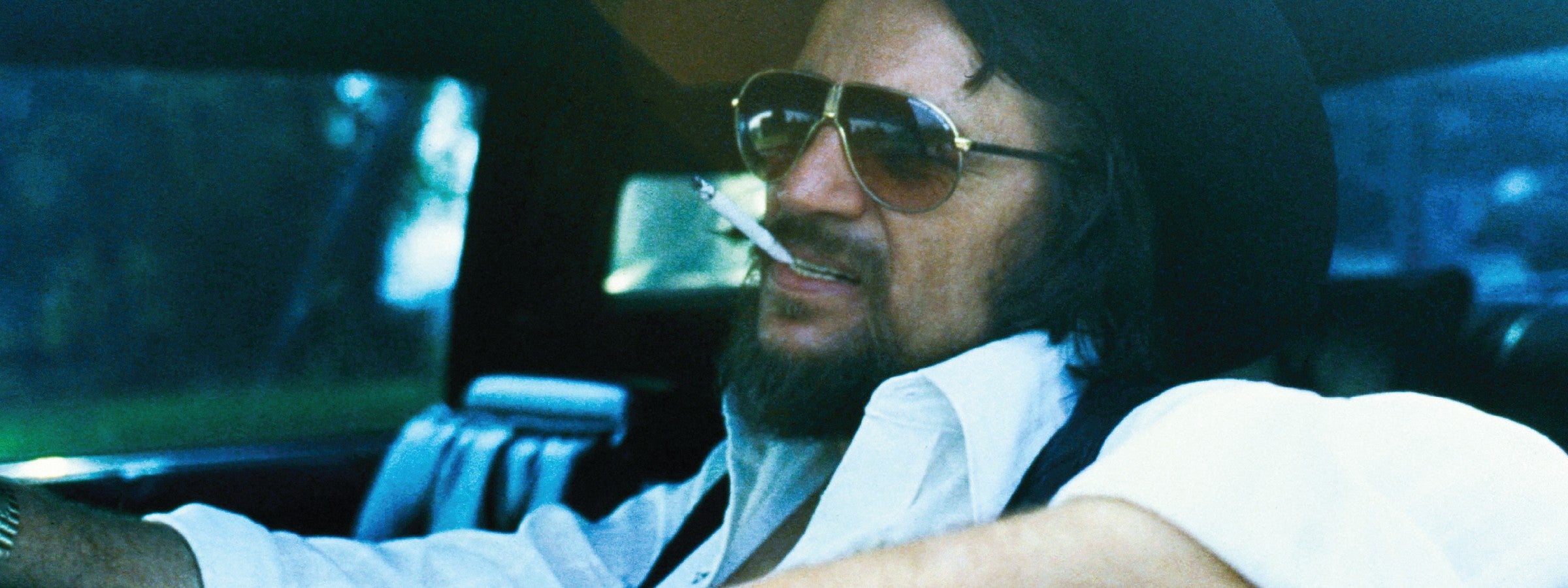 Waylon Jennings in a car, Diamonds album cover photograph